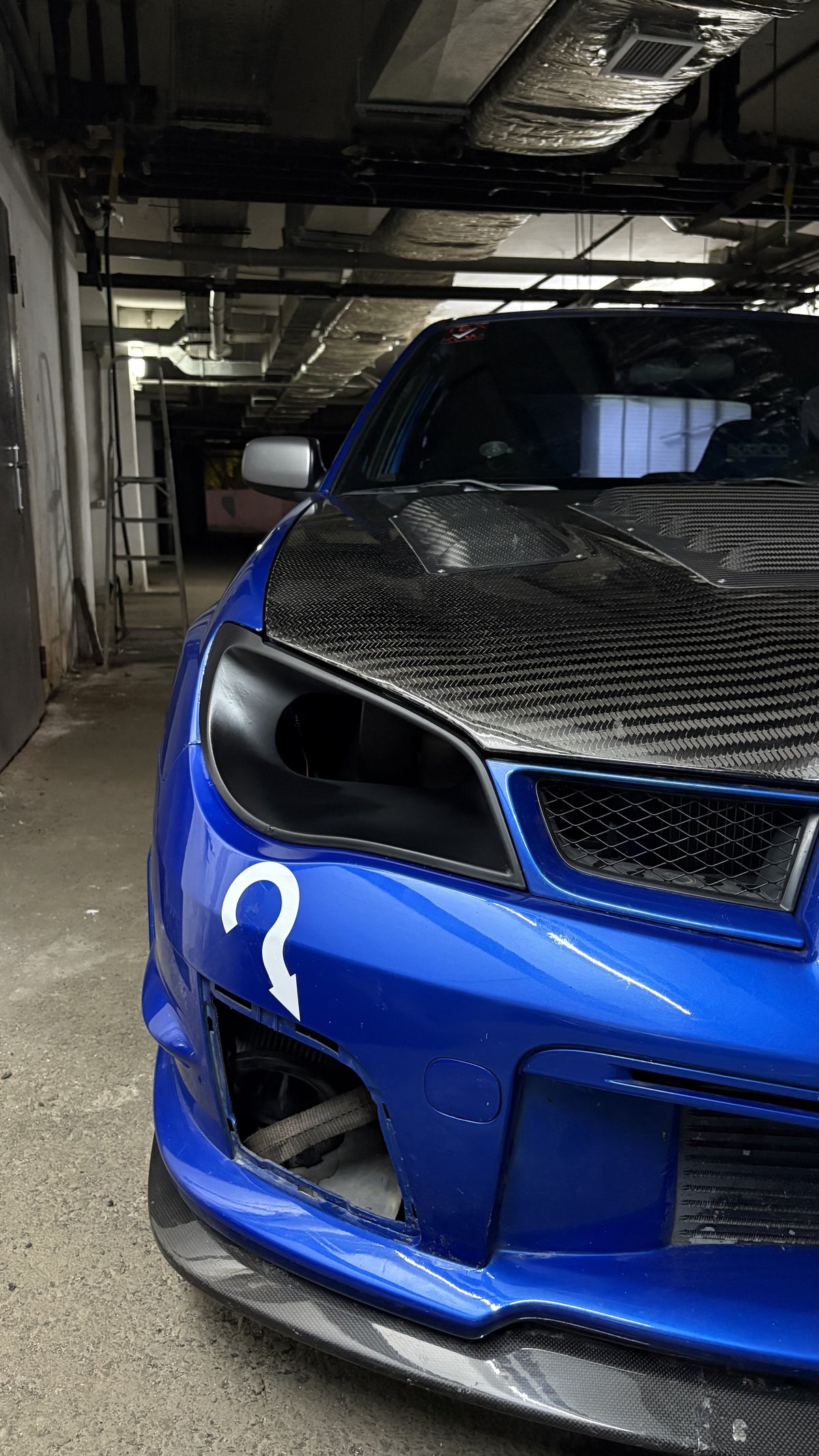 Subaru Impreza GDB with this headlight delete intake